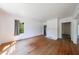 Bright and open living room boasts hardwood flooring and a fireplace at 1685 Carroll Nw Dr, Atlanta, GA 30318