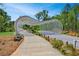 Shirley Clarke Franklin Park featuring modern sculpture, paved walkways, and views of surrounding greenery at 1685 Carroll Nw Dr, Atlanta, GA 30318