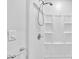 Shower with shelving and updated shower head at 1685 Carroll Nw Dr, Atlanta, GA 30318