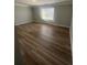 An open bedroom design provides a bright and airy space for relaxation and rest at 2763 Storybook Ct, Grayson, GA 30017