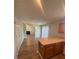 Open-concept space with island counter overlooking the living room at 2763 Storybook Ct, Grayson, GA 30017