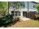 Backyard featuring a small concrete patio and a landscaped area at 2857 Regal Park # 3, Atlanta, GA 30318