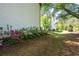 Home with a well-manicured backyard featuring plenty of greenery and some flowering bushes at 2857 Regal Park # 3, Atlanta, GA 30318