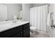 Bathroom featuring a vanity, a toilet, and a shower curtain at 2857 Regal Park # 3, Atlanta, GA 30318