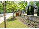 Inviting community entrance with brick signage and well-maintained landscaping at 2857 Regal Park # 3, Atlanta, GA 30318