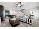 Open concept living room and kitchen is bright and inviting with luxury vinyl plank flooring at 2857 Regal Park # 3, Atlanta, GA 30318