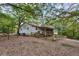 A spacious backyard featuring a deck with a wooden fence, perfect for outdoor entertaining and relaxation at 3024 Bob Cox Rd, Marietta, GA 30064