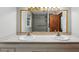 Spacious bathroom featuring double sinks and a large mirror reflecting the shower and toilet area at 3024 Bob Cox Rd, Marietta, GA 30064