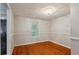 The bedroom features hardwood floors and a window with natural light at 3024 Bob Cox Rd, Marietta, GA 30064
