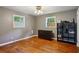 Bedroom featuring two windows, dresser, and shelf at 3024 Bob Cox Rd, Marietta, GA 30064