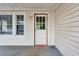 Inviting front entrance with a decorative door, sidelight window, and warm welcome mat at 3024 Bob Cox Rd, Marietta, GA 30064