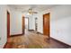 Hallway with hardwood floors, leading to various rooms, offering smooth transitions throughout the home at 3024 Bob Cox Rd, Marietta, GA 30064