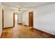 Hallway with wood floors and doors leading to bathroom and bedrooms at 3024 Bob Cox Rd, Marietta, GA 30064
