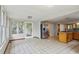 Bright, open kitchen with center island, natural light and retro style floor at 3024 Bob Cox Rd, Marietta, GA 30064