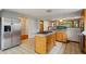 Updated kitchen featuring stainless steel appliances and a center island with cooktop at 3024 Bob Cox Rd, Marietta, GA 30064