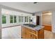 A bright kitchen area with stainless fridge and center cook island at 3024 Bob Cox Rd, Marietta, GA 30064
