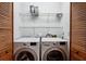 Laundry closet featuring a stacked washer and dryer at 3024 Bob Cox Rd, Marietta, GA 30064
