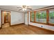 A bright living room featuring wood trim, hardwood floors, and a view to the outdoors at 3024 Bob Cox Rd, Marietta, GA 30064