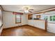 Living room boasts hardwood floors, traditional trim, and a large window for natural light at 3024 Bob Cox Rd, Marietta, GA 30064