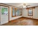Living room featuring hardwood floors, wood trim, and exterior door with windows at 3024 Bob Cox Rd, Marietta, GA 30064