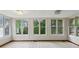 Bright sunroom with many windows, offering a peaceful space to relax and enjoy views at 3024 Bob Cox Rd, Marietta, GA 30064