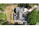 Aerial view of a home with a well-maintained roof, manicured lawn, and a private backyard deck with gazebo at 11050 Linbrook Ln, Duluth, GA 30097