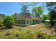Inviting backyard with screened porch and gazebo, ideal for outdoor gatherings and relaxation at 11050 Linbrook Ln, Duluth, GA 30097