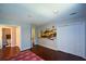 Spacious bedroom features hardwood floors, a double-door closet, and neutral paint at 11050 Linbrook Ln, Duluth, GA 30097