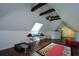 Lofted bonus room features hardwood floors, skylight, and beamed ceiling at 11050 Linbrook Ln, Duluth, GA 30097