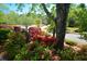 Colorful flowers blooming in the landscaped front yard of this suburban home at 11050 Linbrook Ln, Duluth, GA 30097