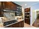 Gourmet kitchen featuring granite countertops, gas range, and stainless steel appliances at 11050 Linbrook Ln, Duluth, GA 30097