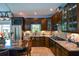 Modern kitchen with stainless steel appliances, granite countertops, and natural light at 11050 Linbrook Ln, Duluth, GA 30097