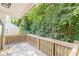 Secluded back porch offers a refreshing view of lush greenery, ideal for unwinding and enjoying nature's beauty at 1404 E Forrest Ave, Atlanta, GA 30344