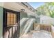Private back porch features a secure door and a tranquil, shaded outdoor space perfect for relaxation at 1404 E Forrest Ave, Atlanta, GA 30344