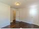 This bedroom offers gleaming hardwood floors and neutral paint, and is ready for your personal touches at 1404 E Forrest Ave, Atlanta, GA 30344