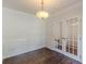 This room offers hardwoods, natural light, and wainscotting at 1404 E Forrest Ave, Atlanta, GA 30344