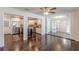 Spacious open layout with hardwood floors seamlessly connecting the living room, kitchen, and dining areas at 1404 E Forrest Ave, Atlanta, GA 30344