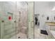 Beautifully designed walk-in shower featuring a built-in bench and neutral tiling at 1438 Sutters Pond Nw Dr, Kennesaw, GA 30152