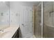 Well-appointed bathroom featuring a spacious vanity, modern fixtures, and tiled walk-in shower at 1438 Sutters Pond Nw Dr, Kennesaw, GA 30152