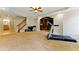 Spacious carpeted basement area with stairs, home gym, and open layout to living space at 317 Vista Lake Dr, Suwanee, GA 30024