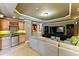 Entertainer's basement with a wet bar, wine storage, mini fridge and large living area at 317 Vista Lake Dr, Suwanee, GA 30024