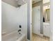 Bathroom with a tiled shower and vanity with marble countertops at 317 Vista Lake Dr, Suwanee, GA 30024