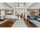 Spacious foyer featuring hardwood floors, a grand staircase, and elegant decor at 317 Vista Lake Dr, Suwanee, GA 30024