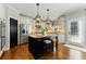Beautiful kitchen featuring a granite island, stainless steel appliances, and custom cabinets at 317 Vista Lake Dr, Suwanee, GA 30024