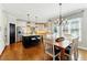 Charming kitchen with large island, stainless appliances, and ample counter space at 317 Vista Lake Dr, Suwanee, GA 30024