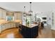 Open kitchen and dining area with modern appliances and plenty of counter space, great for entertaining at 317 Vista Lake Dr, Suwanee, GA 30024