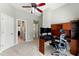 Office with a desk, computer, and direct bathroom access at 317 Vista Lake Dr, Suwanee, GA 30024