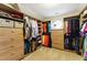 Spacious walk-in closet with custom shelving and drawers for optimal storage at 317 Vista Lake Dr, Suwanee, GA 30024