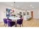 Open-concept kitchen and dining area with modern furnishings and plenty of natural light at 425 Brooch Way, Stockbridge, GA 30281