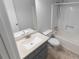 Clean bathroom featuring a shower and bathtub combination and a vanity with sink at 530 Bell Se Rd, Conyers, GA 30094